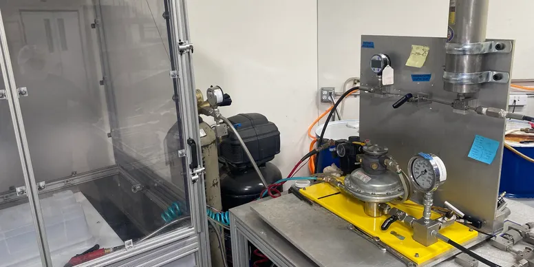 Pressure testing station with gauges and tubing